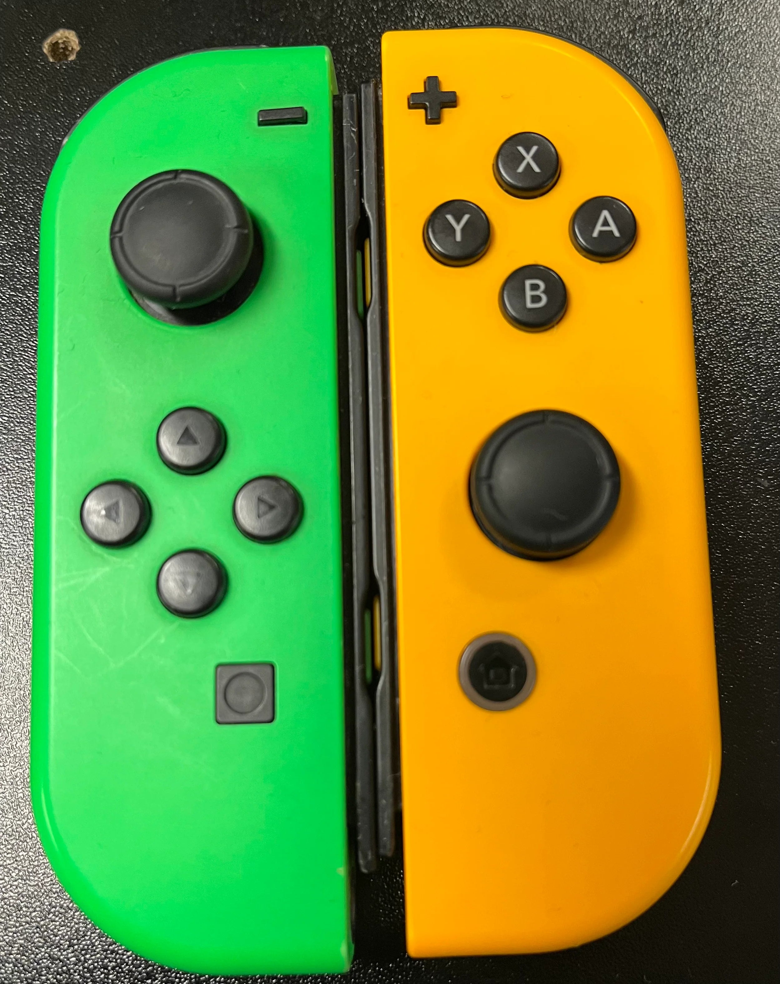 Yellow and 2024 green joycons